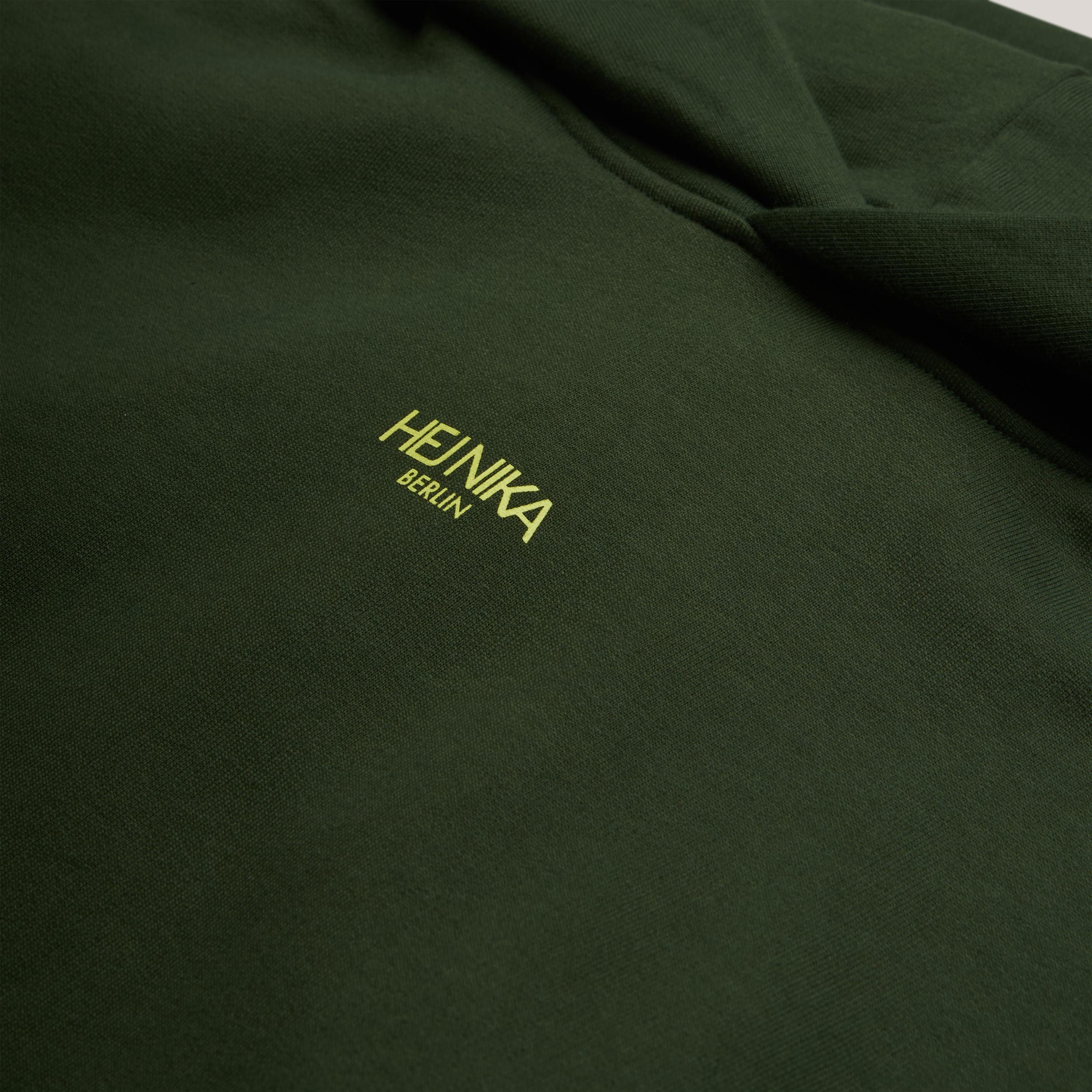 Detailansicht des weichen Innenstoffs aus Bio-Baumwolle und recyceltem Polyester – Grass is Greener Hoodie von Hej Nika